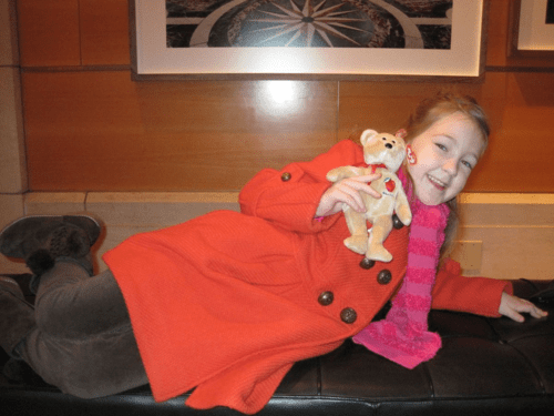 New York City-Four Seasons lobby-girl with big apple beanie bear