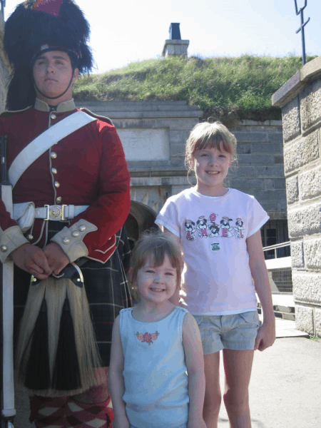 nova scotia-halifax-citadel-girls outside with guard