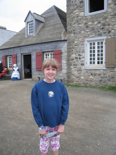 nova scotia-cape breton island-girl at fortress of louisburg