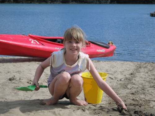 chateau montebello-kenauk-whitefish lake-playing on beach