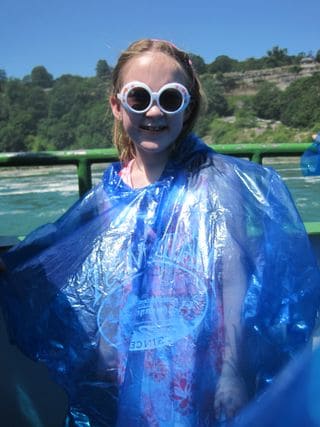 Girl in blue poncho on Maid of the Mist