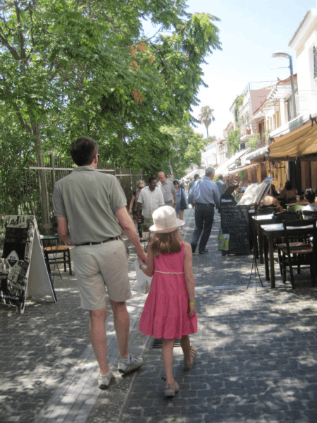 greece-athens-family walking in plaka neighbourhood