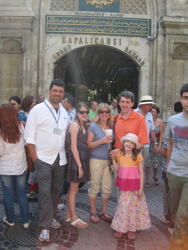 Group of people posing outside the Grand Bazaar in Istanbul.