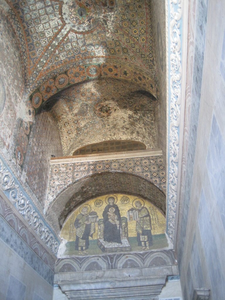 Mosaic art over exit to Hagia Sophia depicting Mary, Jesus and three gift-bearing kings - Istanbul.