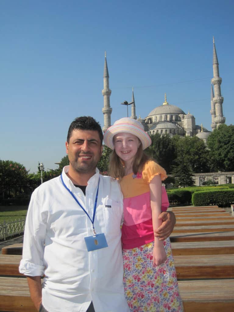 posing with guide in Istanbul, Turkey.