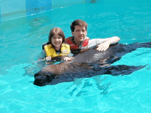 In pool with sea lion at Coral World, St. Thomas, USVI