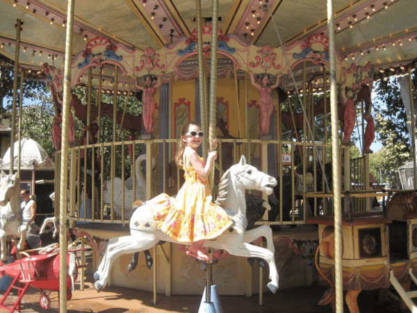 Riding a carousel in Aix-en-Provence, France