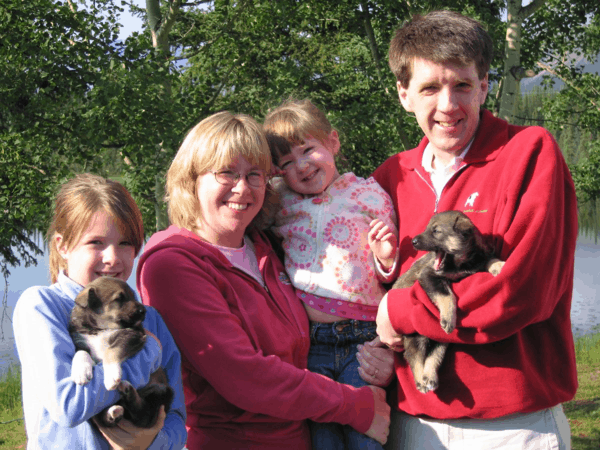 Meeting sled dog puppies at Husky Homestead in Alaska