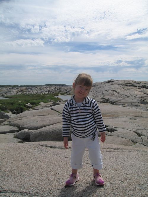 Emma on the rocks at Peggy's Cove