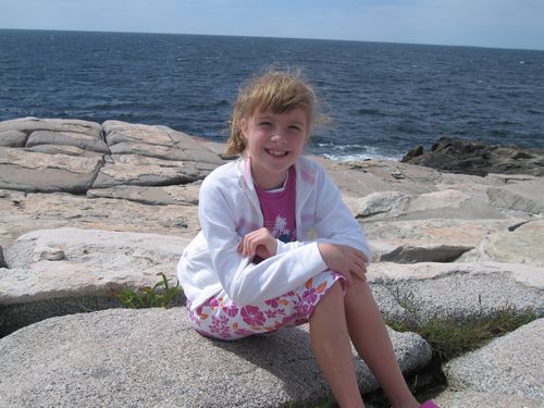 Katie on the rocks of Peggy's Cove