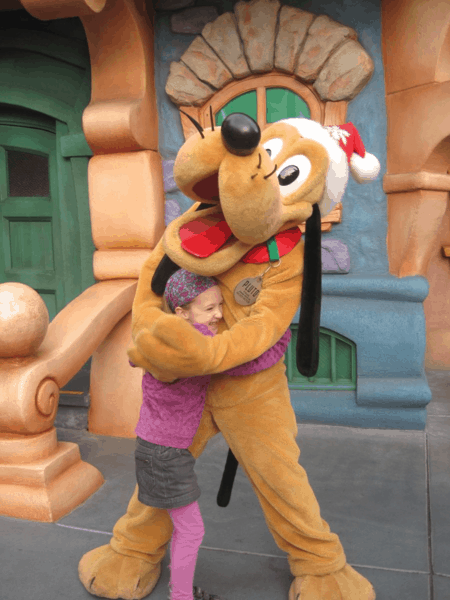Emma and Pluto at Disneyland
