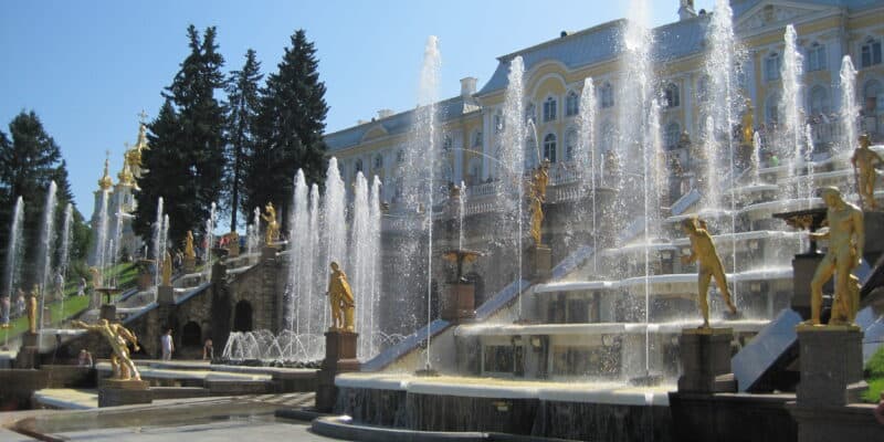 Fountains in Peterhof Palace Gardens, St. Petersburg, Russia on a sunny summer day.