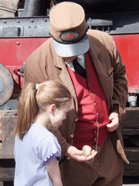 Orlando-WWOHP-Examining Conductor's Watch