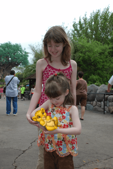 Katie and Emma holding baby Simba