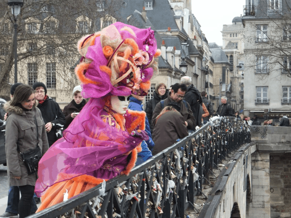 Paris-bridge-love locks-costumed woman