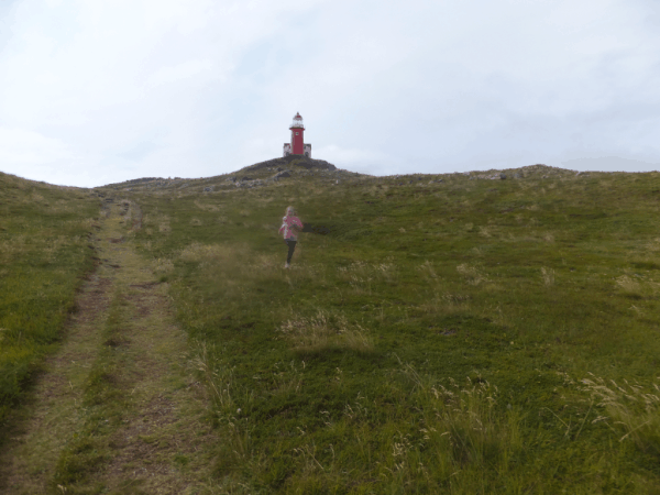 Newfoundland-Ferryland Lighthouse-girl running