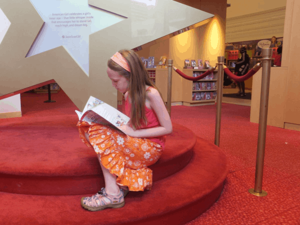 Reading in the American Girl Bookstore