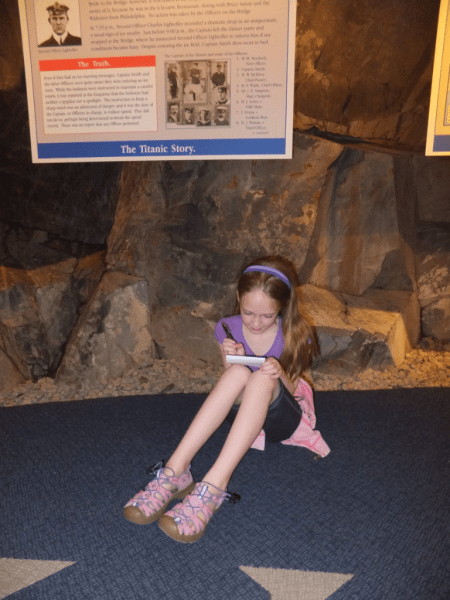 Taking notes at Titanic exhibit-St. John's, Newfoundland