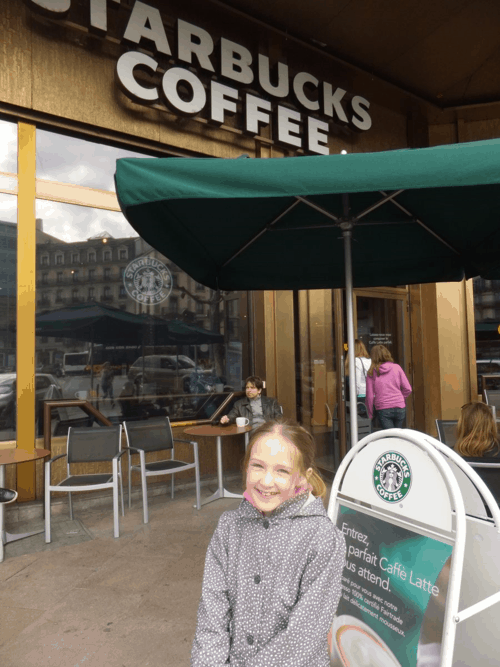 Emma outside Starbucks in Geneva