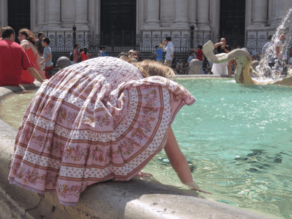 playing in a fountain in Rome