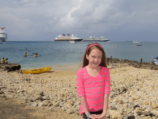 Young girl exploring the port of Grand Cayman. 