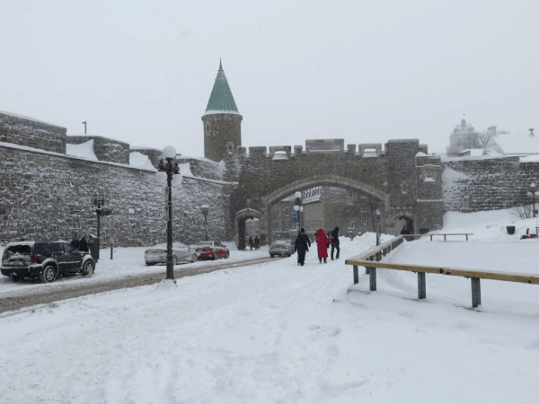 Quebec-walking-tour-near-city gate-winter