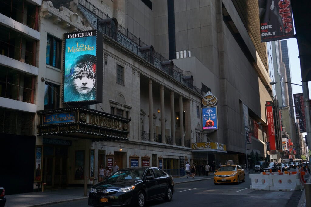 exterior of the Imperial Theatre in NYC with Les Miserables on the marquee.