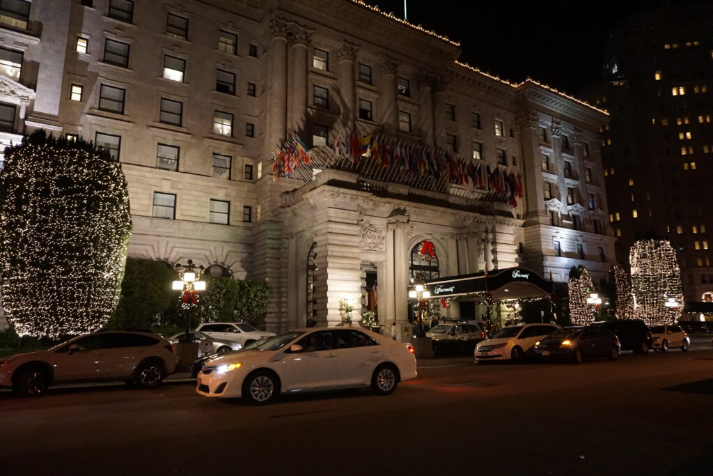 Front entrance of The Fairmont San Francisco in evening during Christmas season.