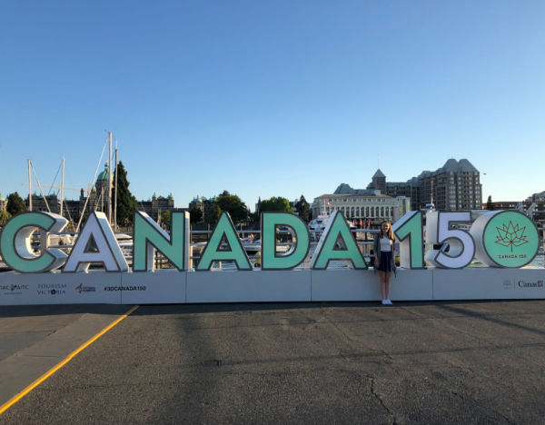 Victoria british columbia inner harbour-girl at canada 150 sign Victoria british columbia inner harbour-girl at canada 150 sign