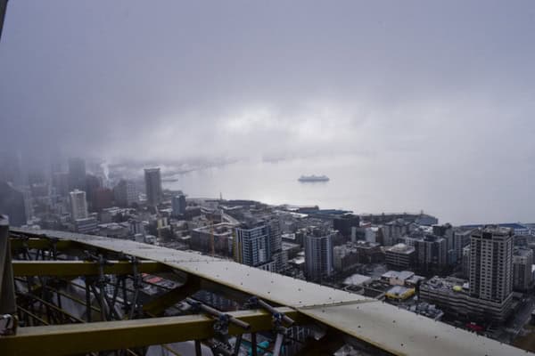 view of city from seattle space needle on a cloudy day.