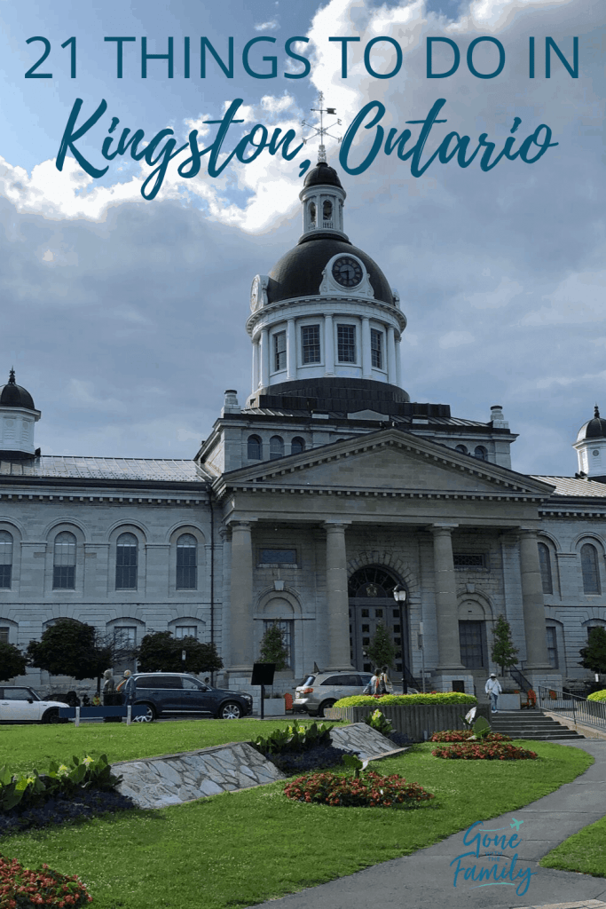City Hall in Kingston, Ontario with flower gardens in foreground