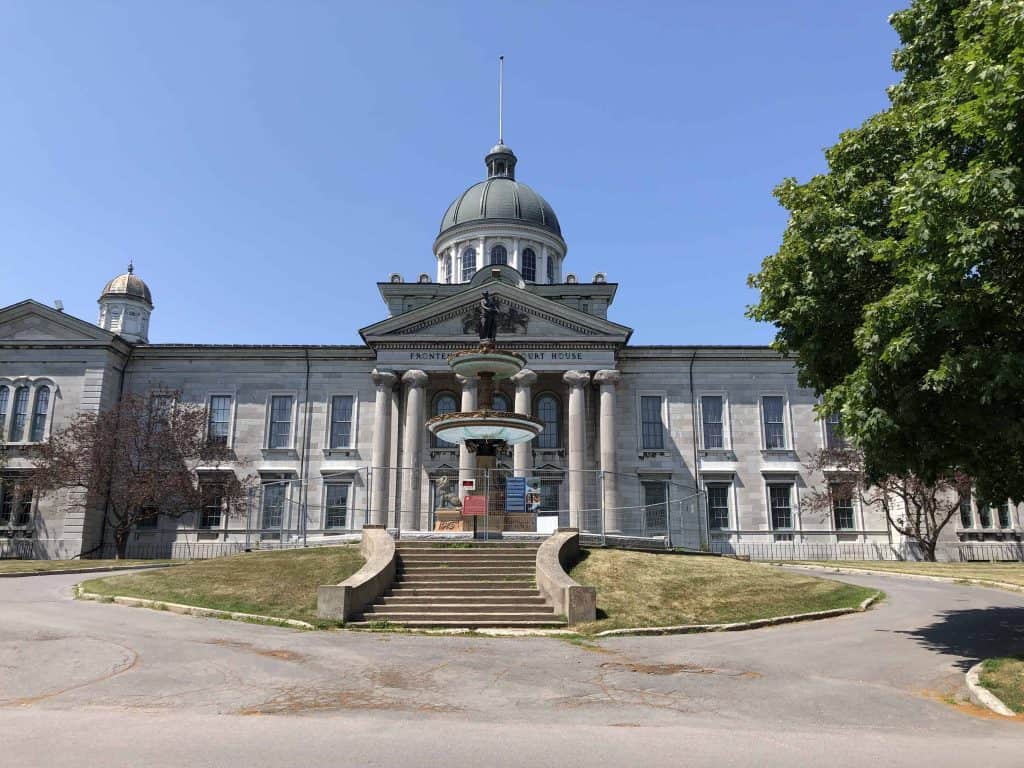 Frontenac County Courthouse with stone fountain in front - kingston, ontario