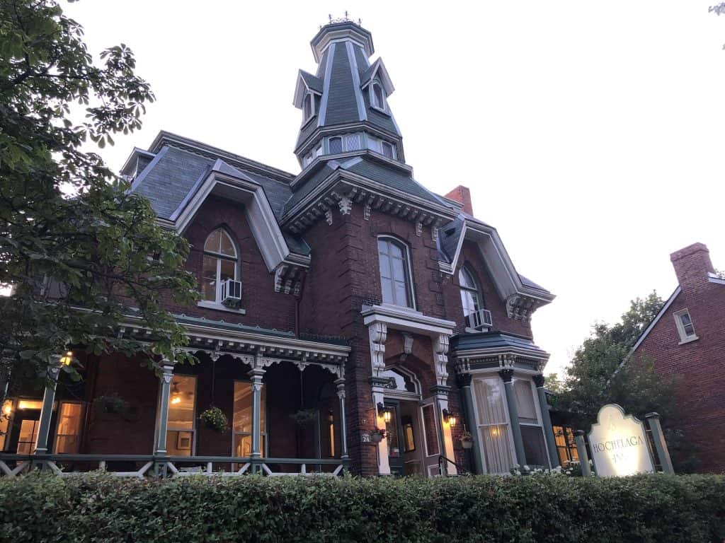 exterior of Victorian-style Hochelaga Inn at dusk