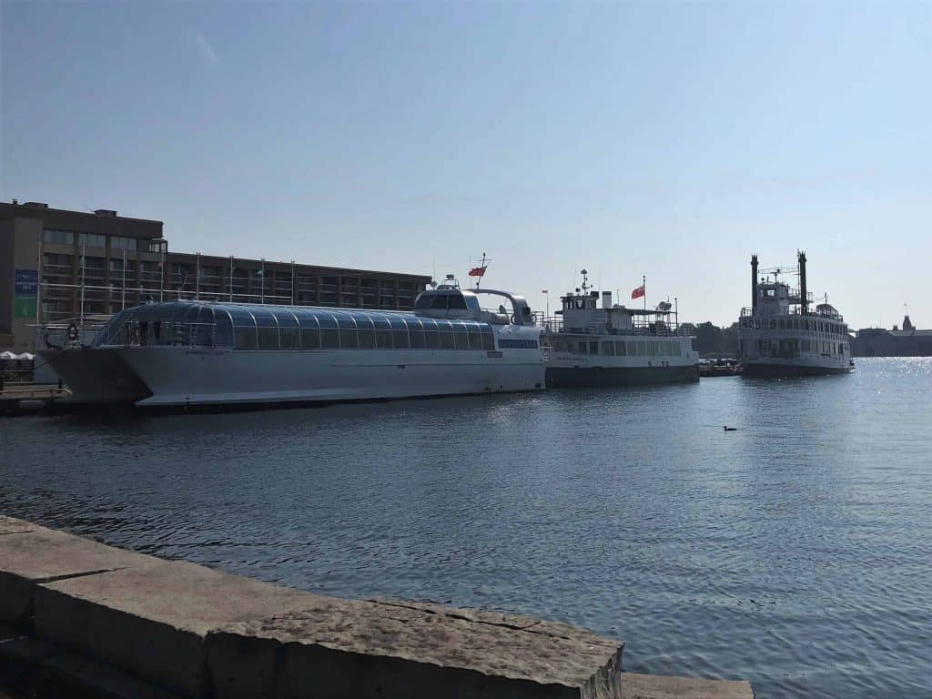 three boats docked in Kingston harbour