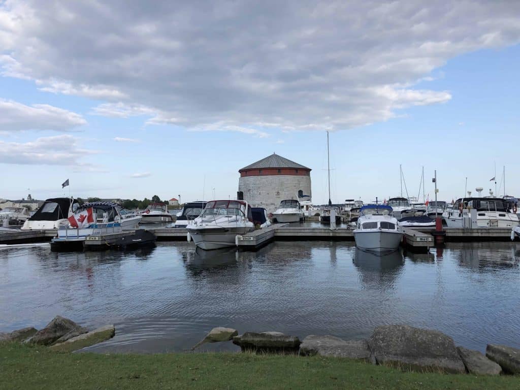 martello tower in kingston harbour with boats in foreground