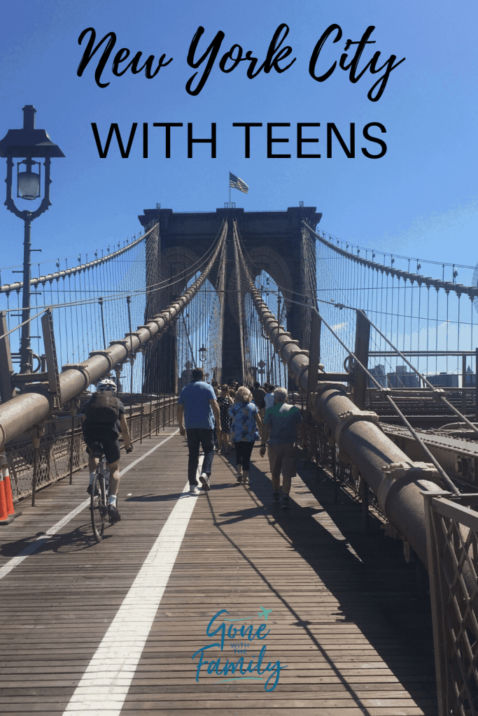 pedestrians and cyclist on brooklyn bridge