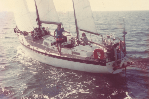 sail boat with family on ocean