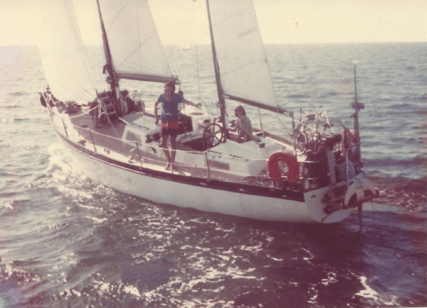 sail boat with family on ocean