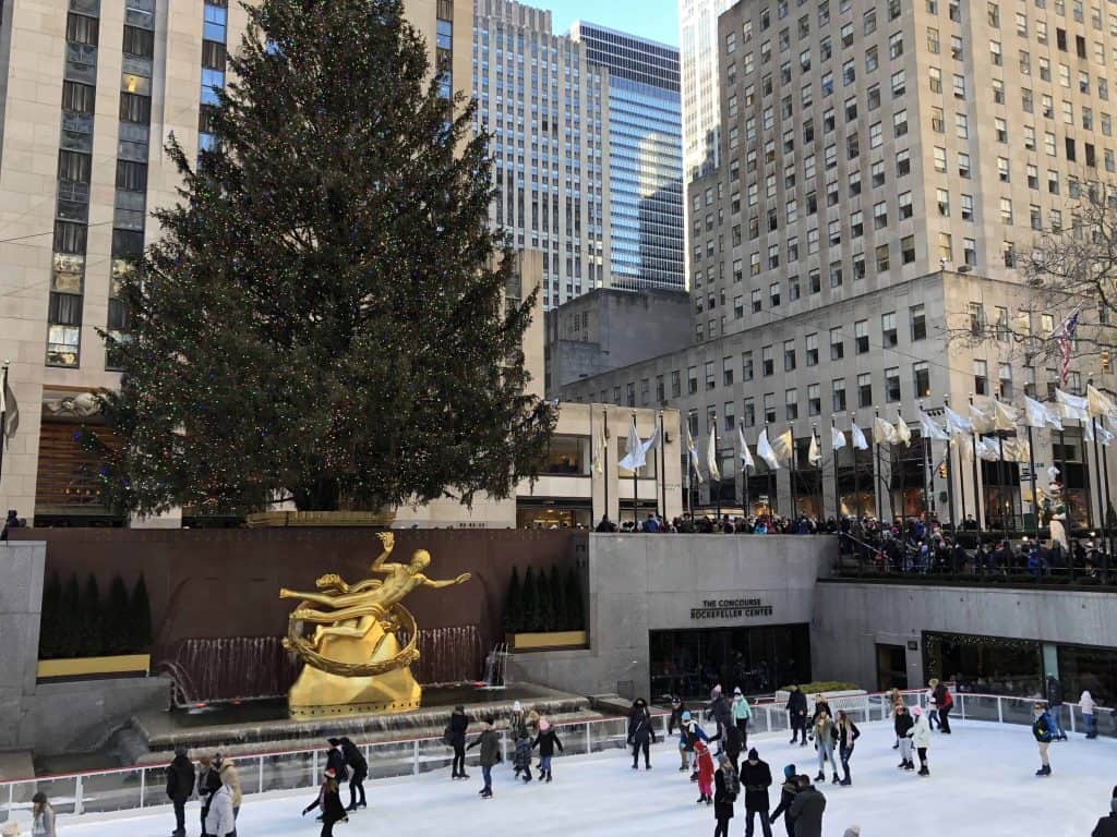 skating at rockefeller plaza with christmas tree