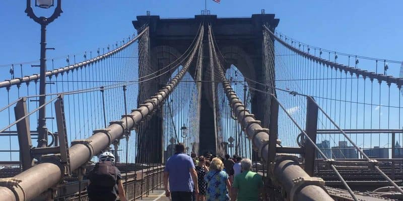 pedestrians and cyclists on brooklyn bridge