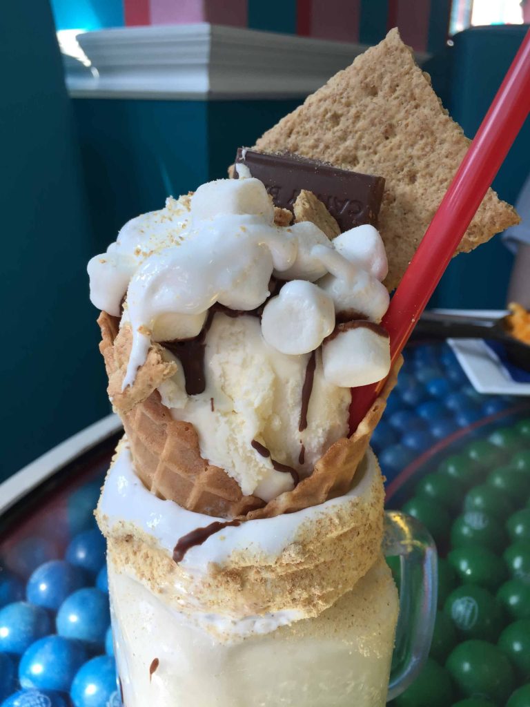 milkshake with waffle cone ice cream marshmallows chocolate and graham crackers