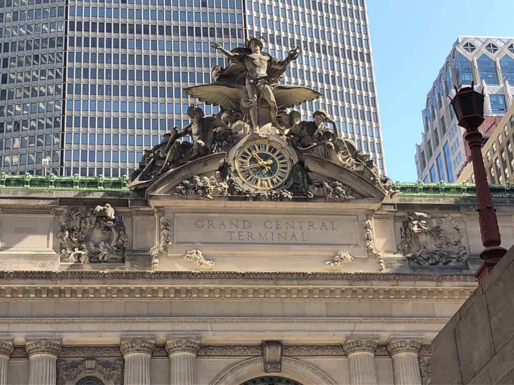 clock face and sculpture on exterior of grand central terminal