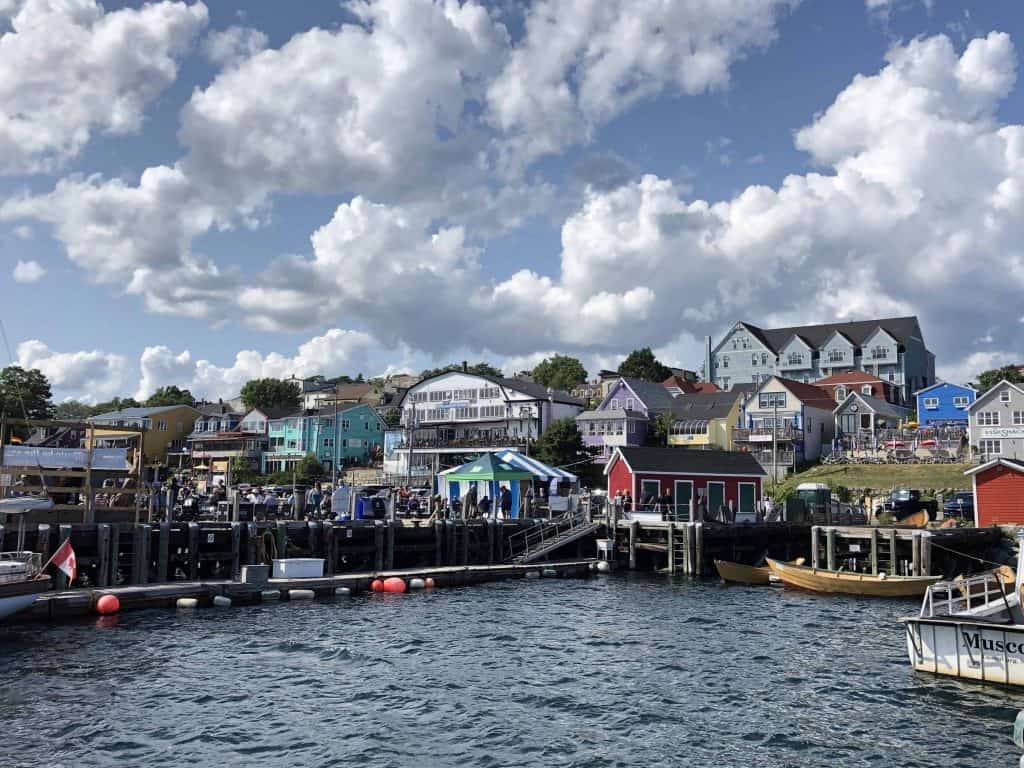 Buildings and pier at waterfront in Lunenburg on a cloudy day