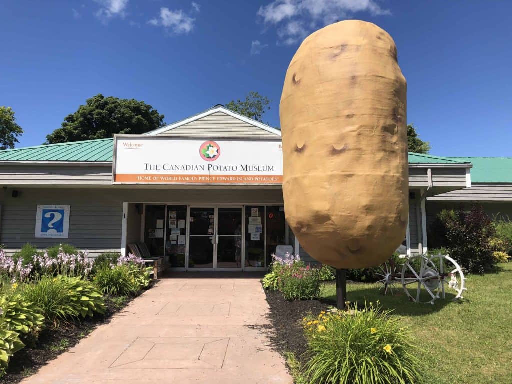 large sculpture of potato outside entrance to The Canadian Potato Museum - prince edward island north cape coastal drive