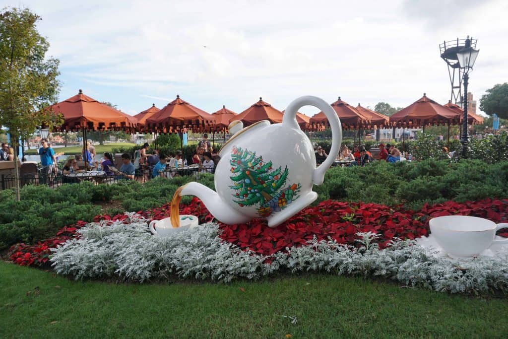 large display with spode christmas teapot pouring tea at epcot