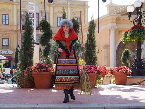 woman with broom dressed as italian befana