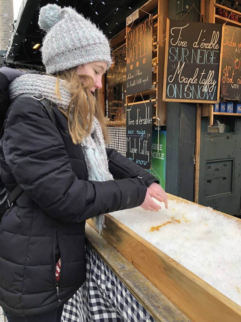 girl making maple taffy