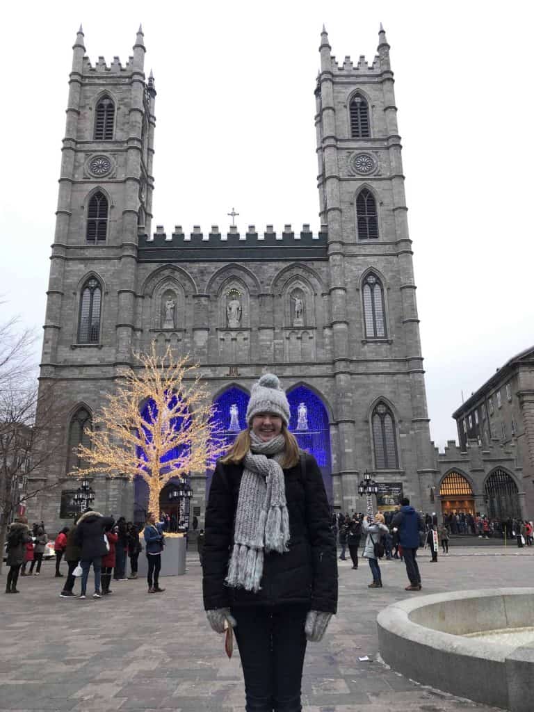 girl in front of notre dame basilica montreal