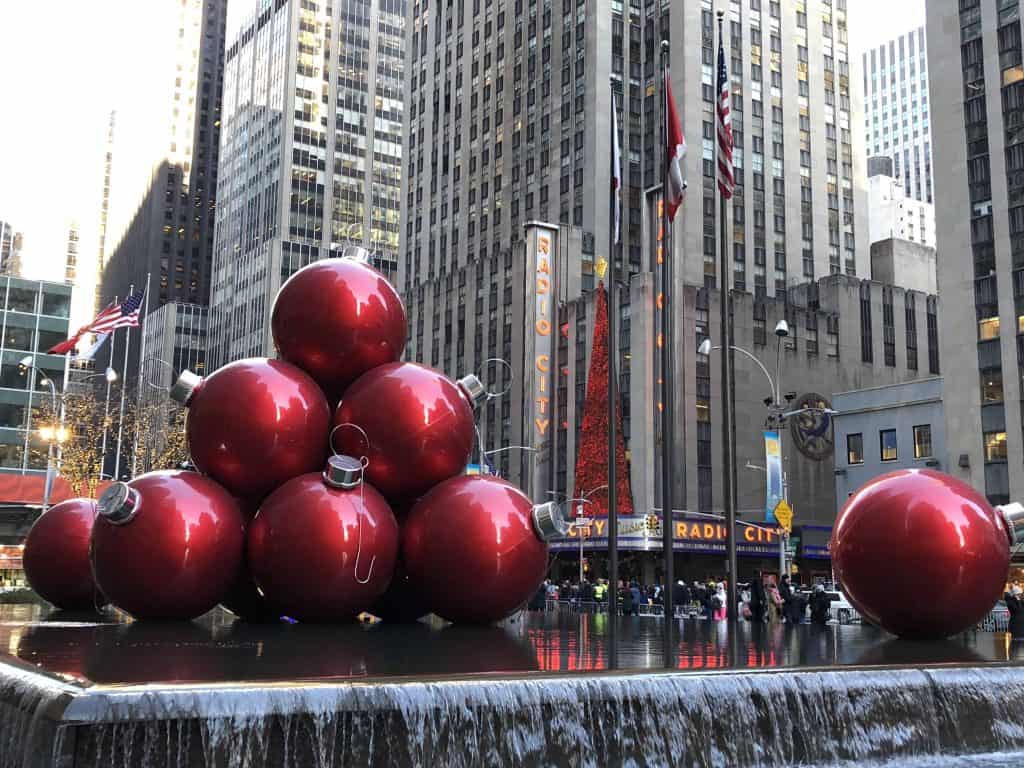 large red Christmas ornament display by Radio City Music Hall-New York City at Christmas