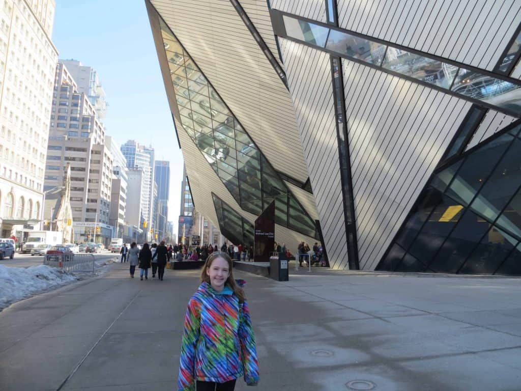 young girl outside royal ontario museum in toronto